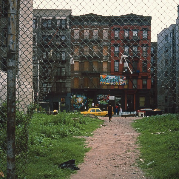 Fence, E. 8th St. bet. Ave. B & Ave. C, 1984, photograph by Philip Pocock.